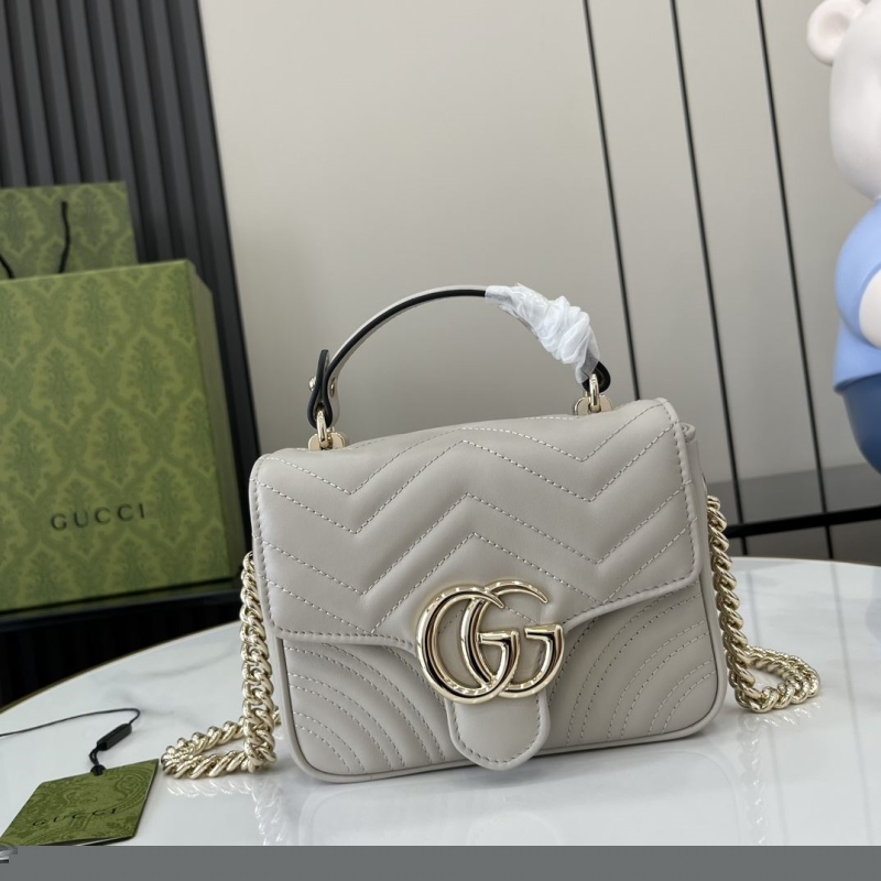 G*u*i top handle bags